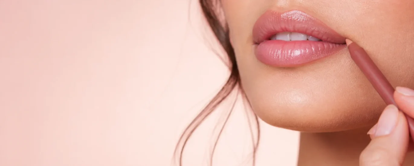 Soft pink lip liner and gloss makeup look